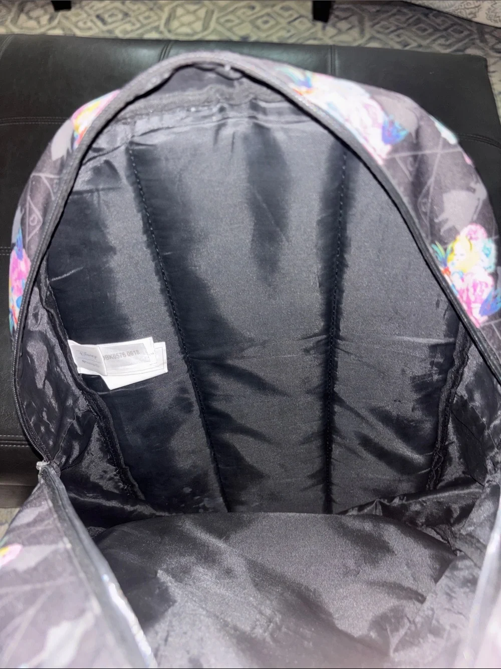 Loungefly backpack motif alice